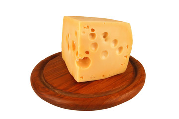 big chunk of yellow cheese on wood plate