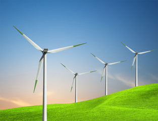 Wind turbines farm on green field