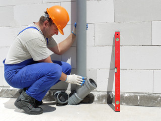 Plumber at work