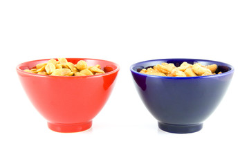 Colorful bowls with nuts