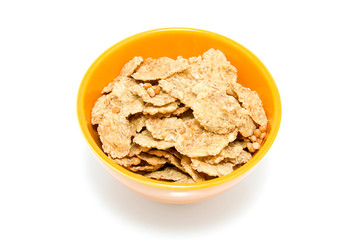 bowl with crunchy cornflakes isolated on white background