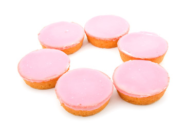 Pink cookies in circle, isolated on white background