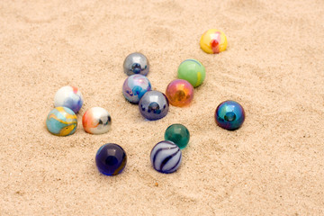 Marbles in sand