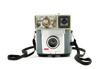 Old fashioned photo camera isolated on white background