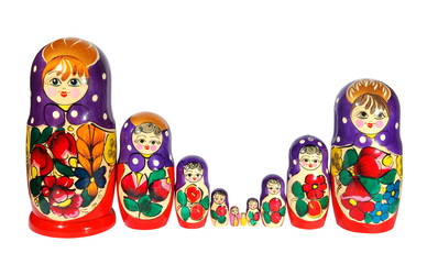 Russian nest-dolls on a white background, painting, wooden