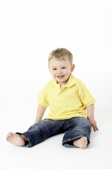 Young Boy Sitting In Studio
