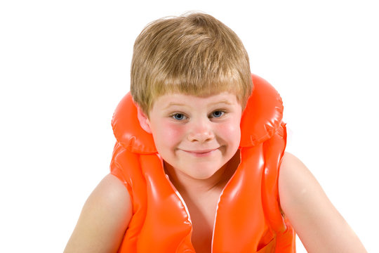 Little Boy In Life Vest