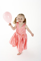 Young Girl Holding Party Balloon