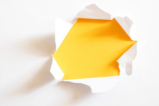 yellow hole in paper