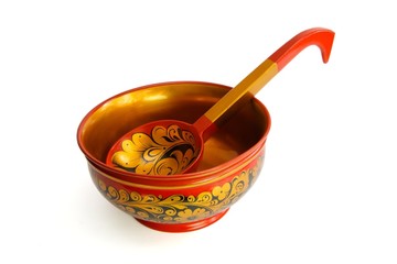 Russian wooden painted bowl with ladle isolated