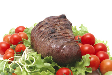 meat and vegetables on transparent dish