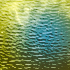 Toned water surface with ripple