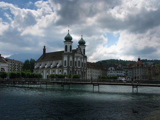 Fototapeta premium scenic lights over the church along the river
