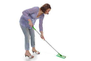 woman washes up the floor by a swab