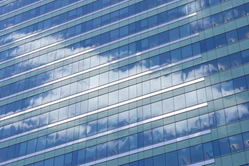 Fototapeta na wymiar Sky Reflection in Office Building Glass