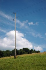 Obraz premium phone line in rural landscape in Poland