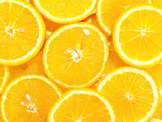 fresh tasty oranges as background on the stack