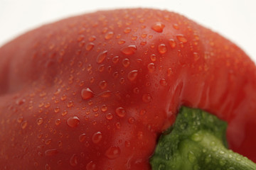 closeup of a red pepper with water drops