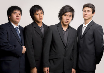 Group of young man in black suit