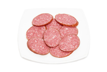 Sliced sausage on the plate