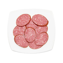 Sliced sausage on the plate