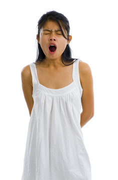 Pretty Asian Woman Yawning, Isolated On White