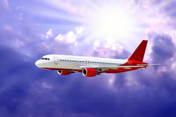 Airplane in air on blue sky