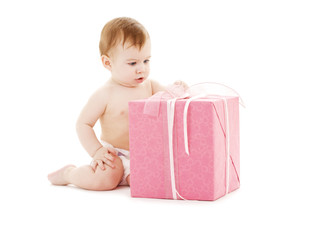 baby boy with big gift box