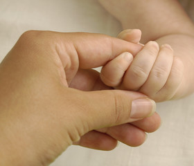 Mother and child hands