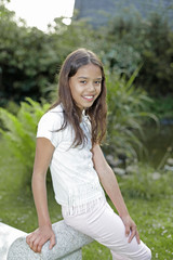 Naklejka premium Girl in the garden