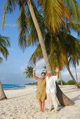 happy european seniors on tropical beach in cuba - 14893827