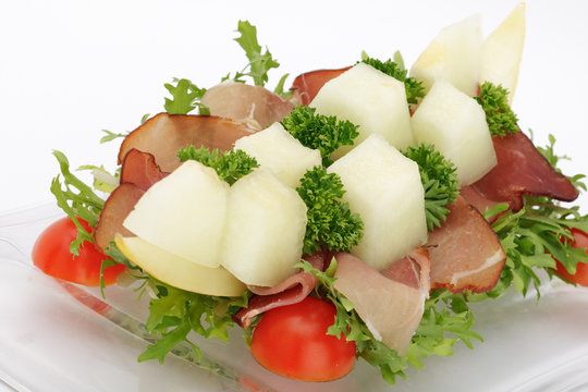 Schinken mit Melonenschiffchen