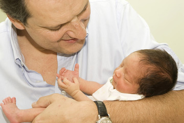 Obraz na płótnie Canvas Father and Newborn baby