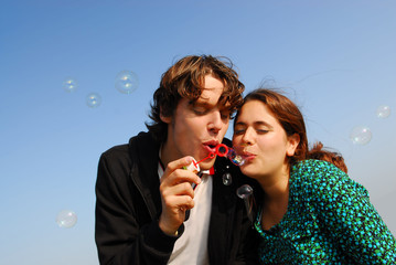 young couple blowing bubbles 7