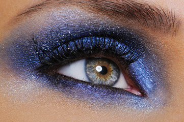eye with bright blue eyeshadow - obrazy, fototapety, plakaty