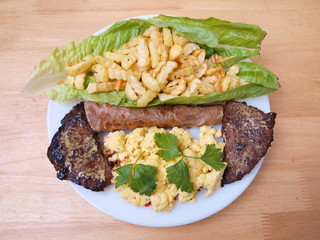 Beef Cutlets Salad Fries Eggs Bread One