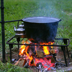 Campfire and caldron.