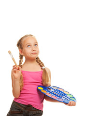 Beautiful little girl with a paintbrush, Isolated on white