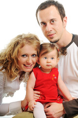 happy young family together in studio