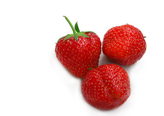 Three strawberry on a white