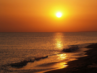 Fototapeta na wymiar Zachód słońca nad plaży w Seascale