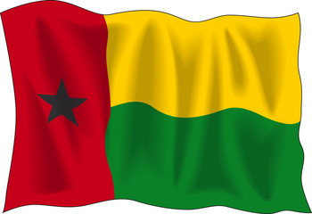 Waving flag of Guinea Bissau isolated on white