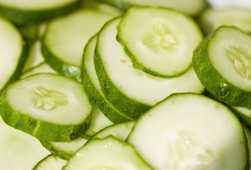 Fresh natural cucumber slice to background