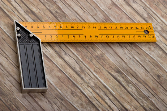 Set-square isolated on old wood