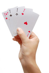 Player’s hand revealing Four Aces