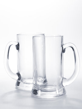 two empty mugs for beer on the table