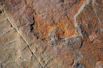 Textured stone with oxided colors