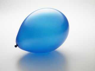 blue color balloon on the the plain color background