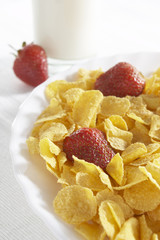 cereals with milk and strawberries
