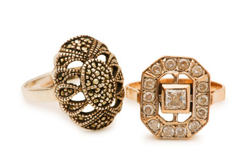 Golden rings isolated on the white background